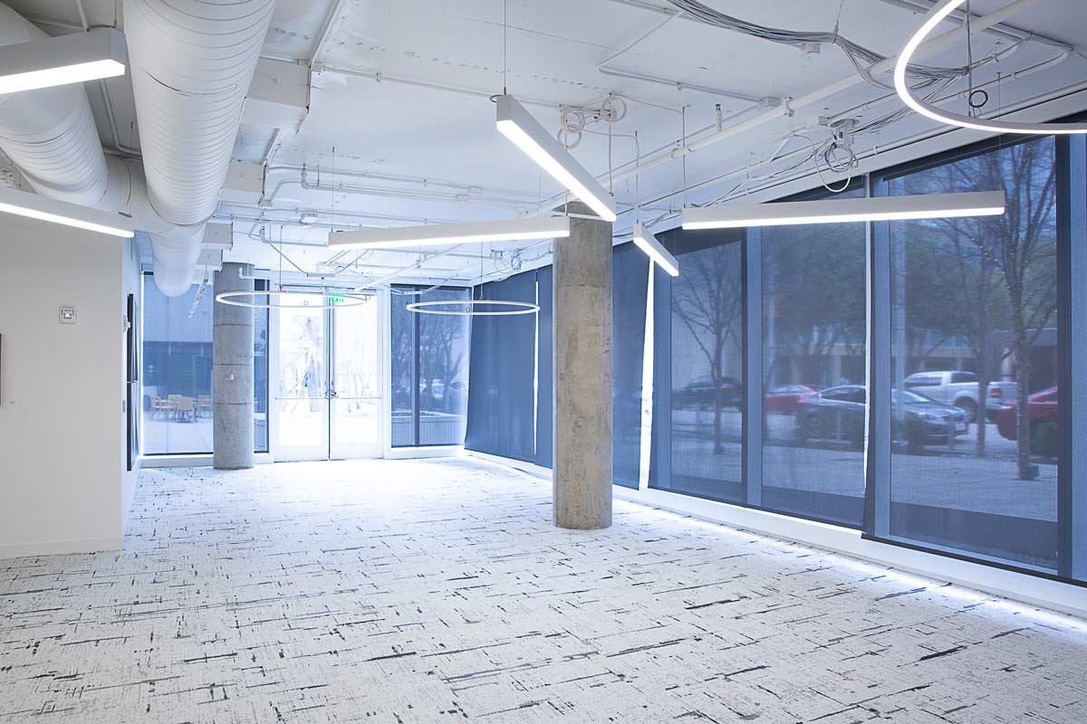 Bright empty office with column and bright lighting