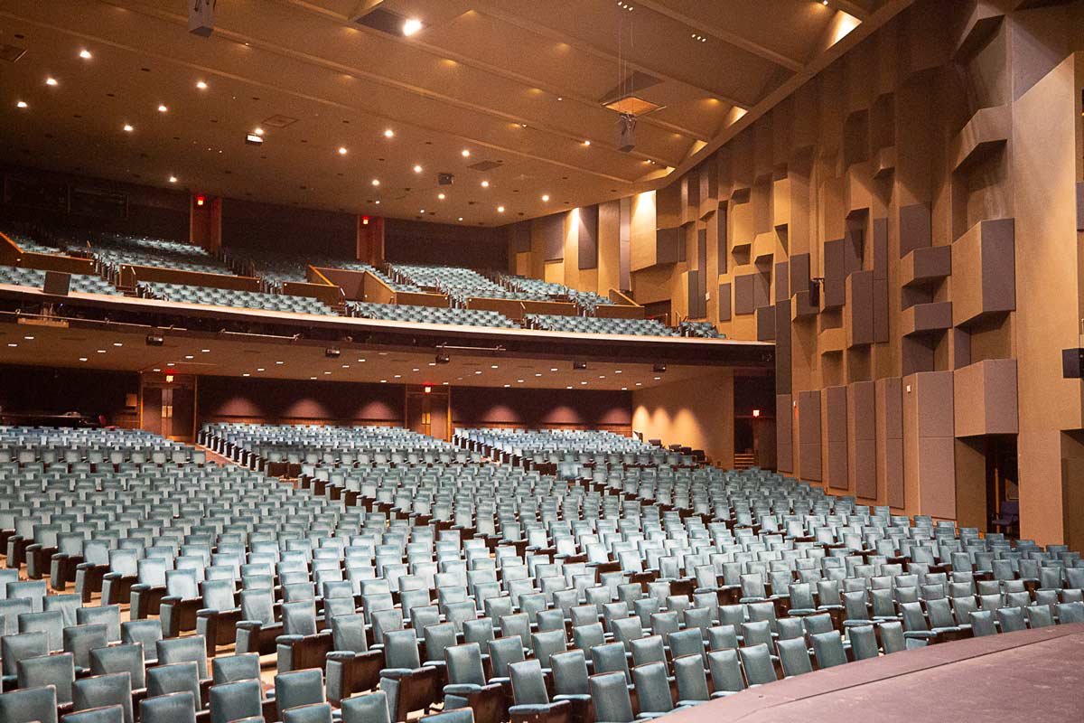 View from the stage showing seating, balcony and side wall