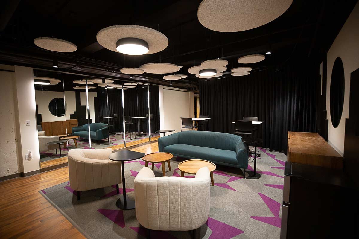 Small louge area with couch and chairs