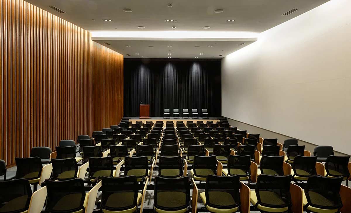 Auditorium stage viewed from the back of the room