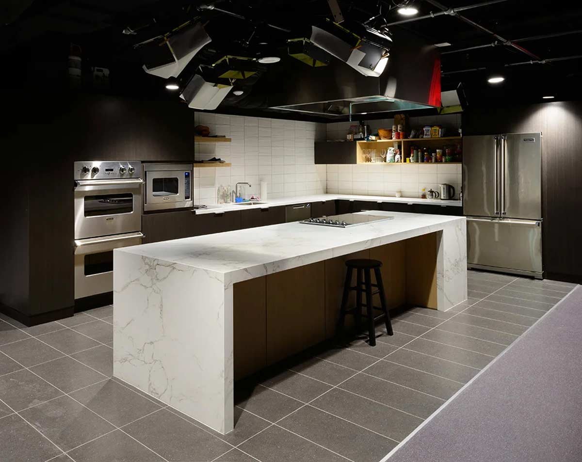 Studio kitchen with light colored countertops