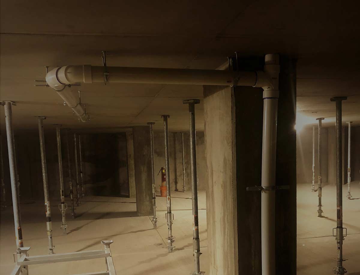 Drain installation in parking garage