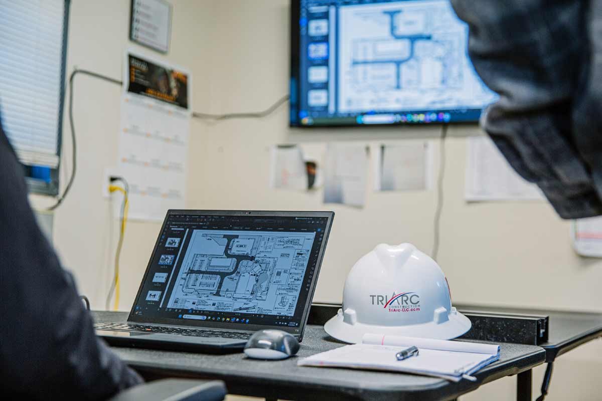 Hardhat and Laptop on office desk