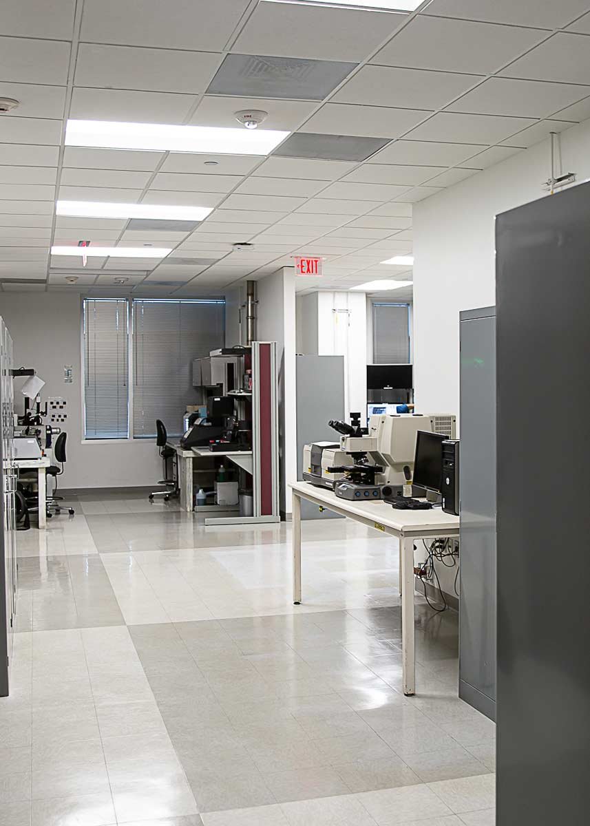 Lab equipment at desks in office