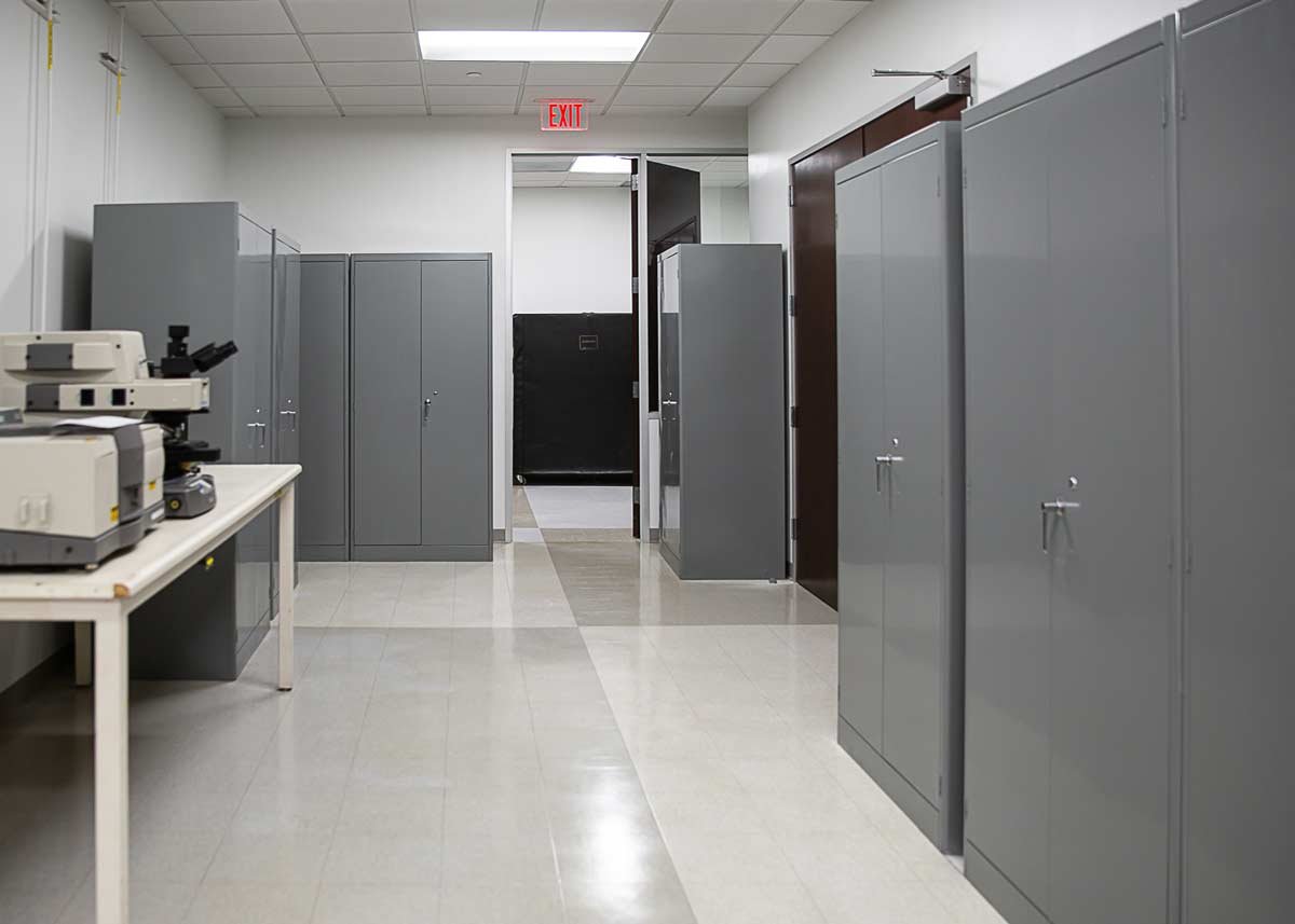 Lots of storage cabinets in office
